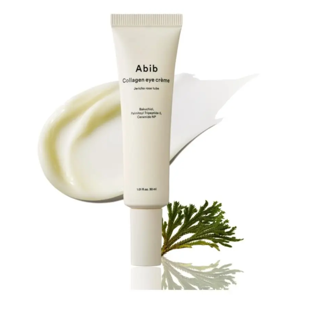 Tube of Abib Collagen eye crème with a green leaf on a white background
