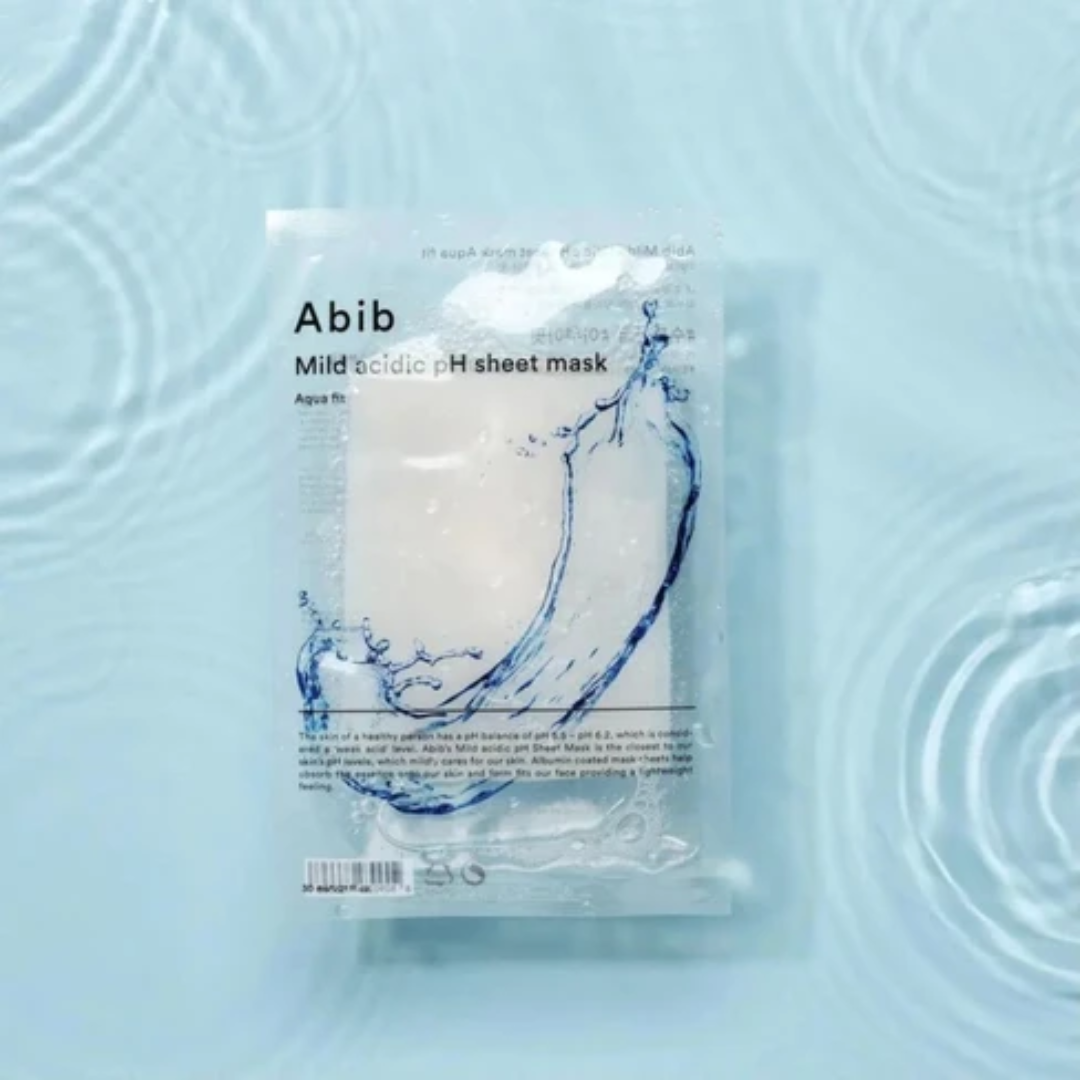 Abib Mild acidic pH sheet mask packaging on a light blue background