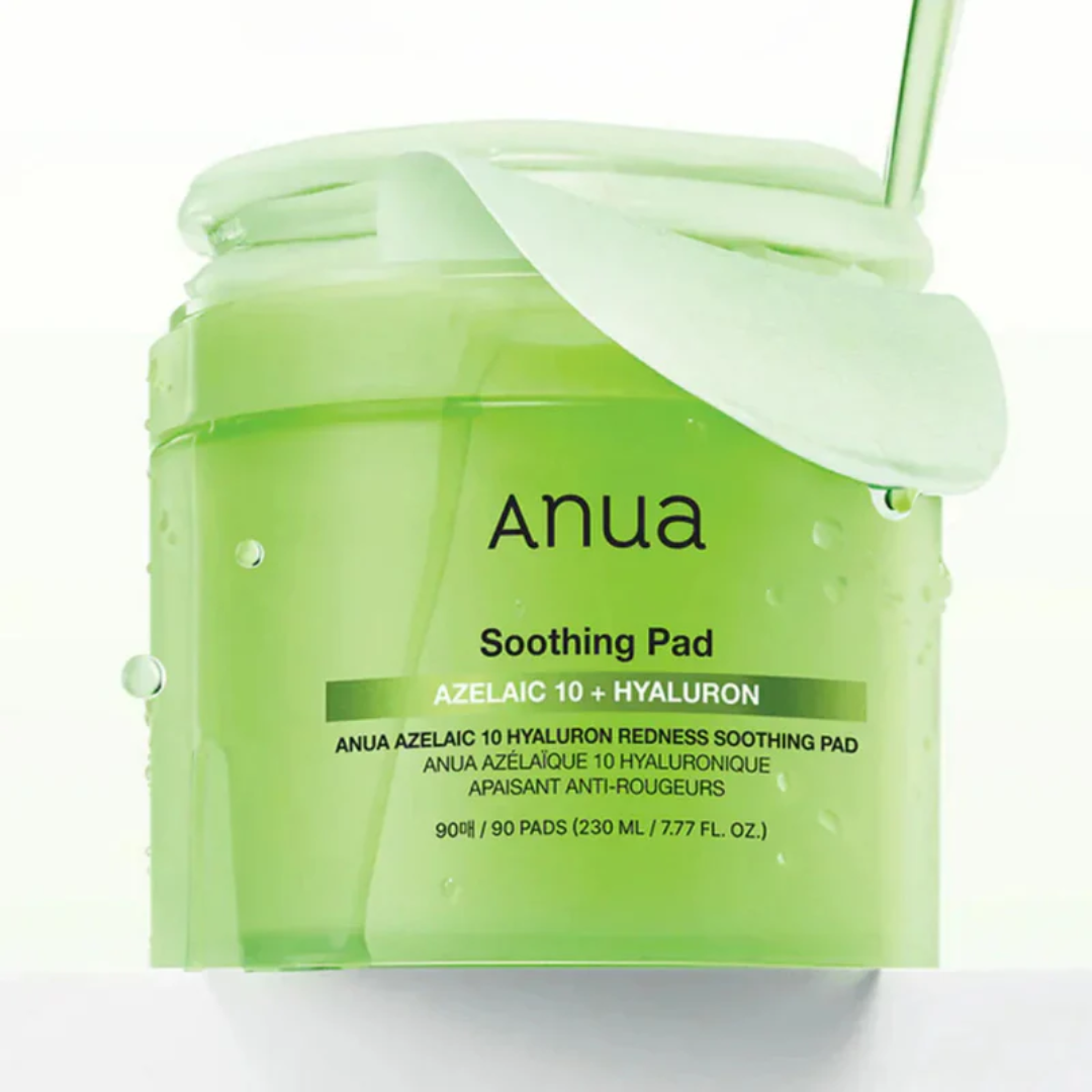Green jar of Anua Soothing Pad with a white lid on a white background