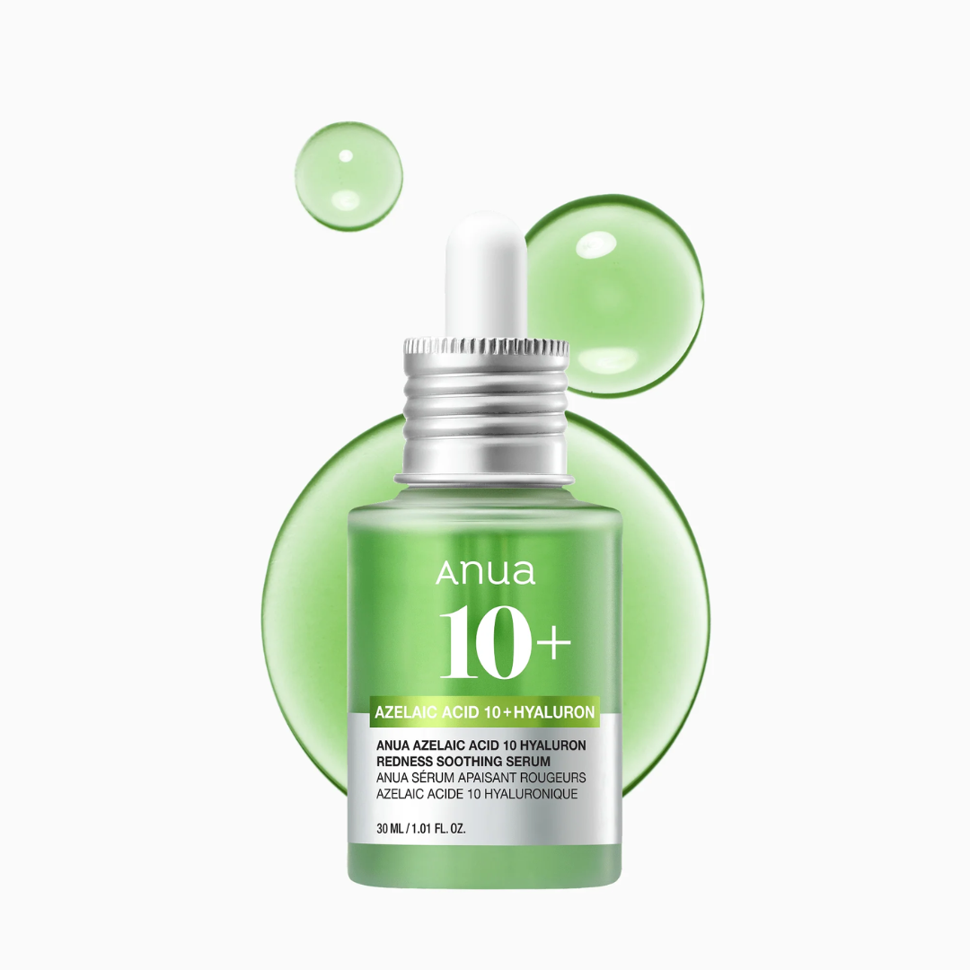 Anua 10+ serum bottle with green droplets on a white background
