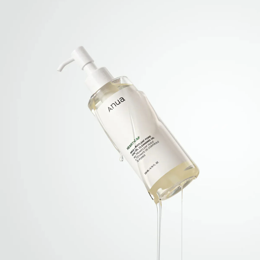 Skincare bottle with a pump dispenser on a light gray background