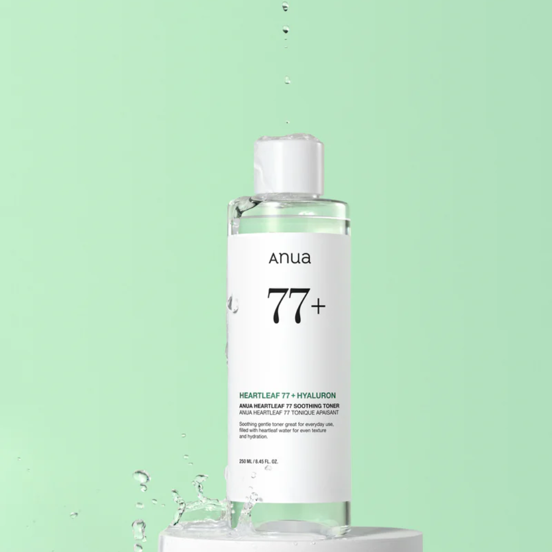 Anua 77+ skincare bottle on a light green background