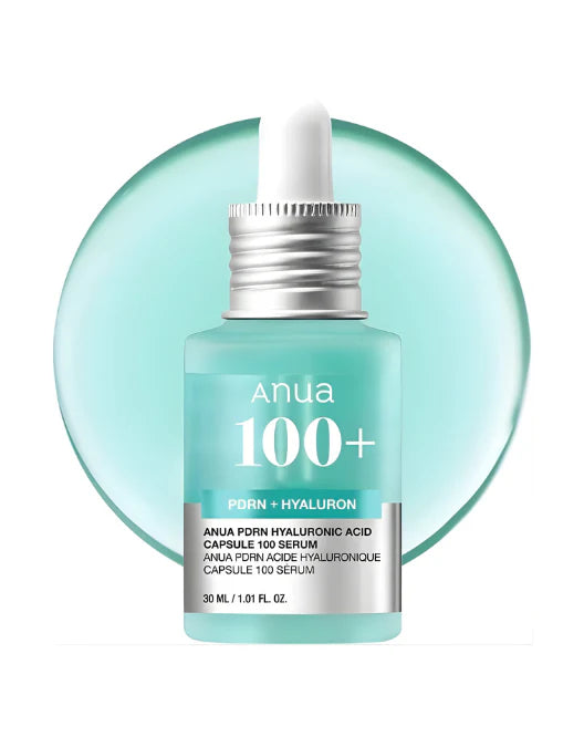 Anua 100+ serum bottle with dropper on a light blue circular background