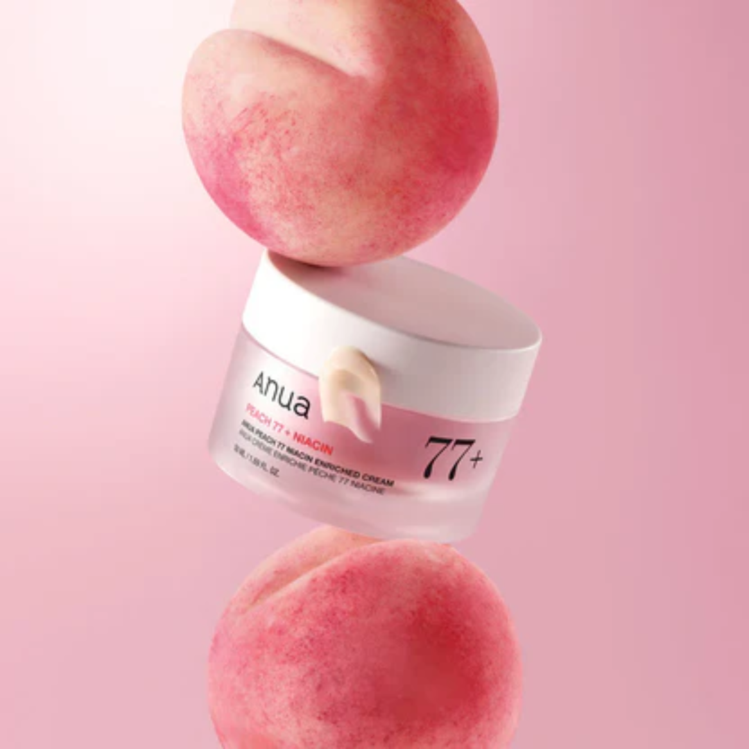 Anua 77+ cream with peaches on a pink background