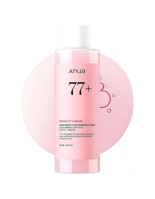 Anua Peach toner bottle with pink liquid on a white background