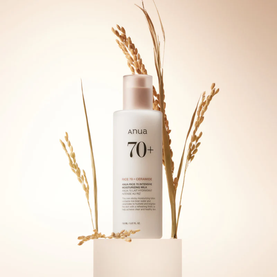 Anua skincare product with wheat stalks on a beige background