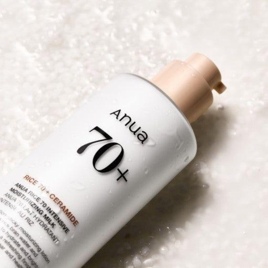 Anua 70+ skincare product bottle on a textured white background