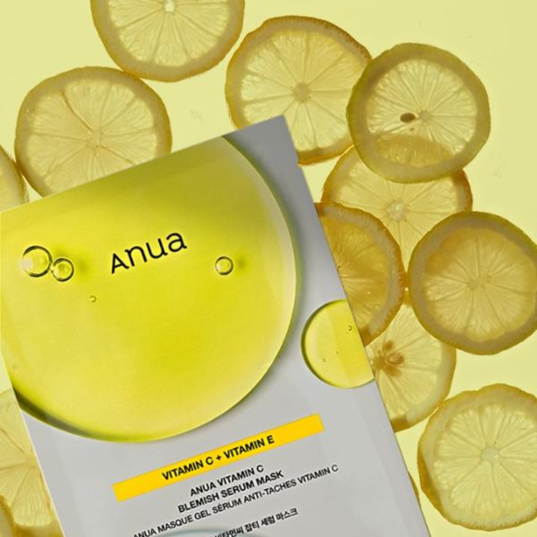 Anua vitamin C and E serum mask with lemon slices on a yellow background