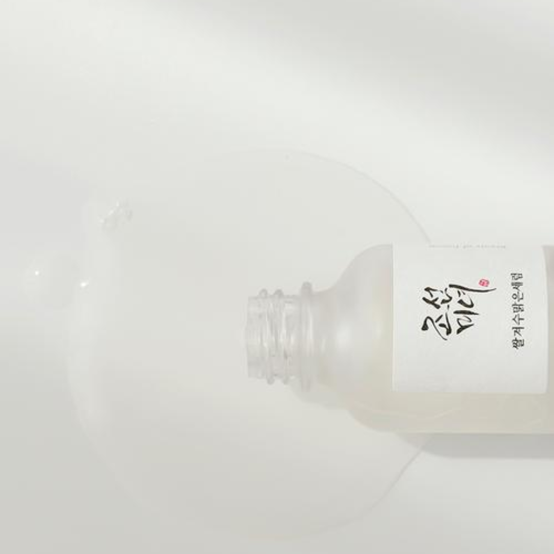 Clear bottle with a white label on a light gray background