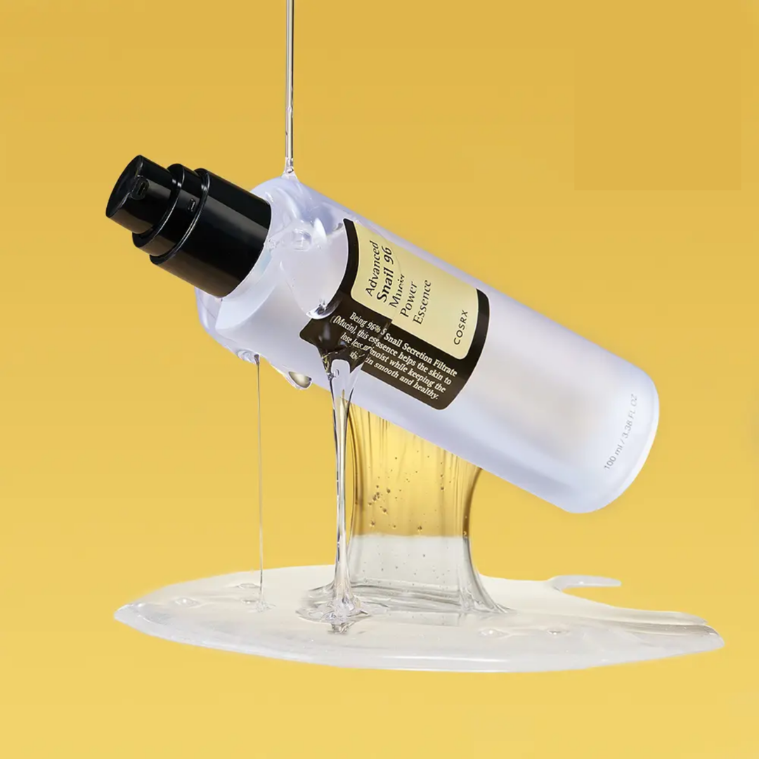 Skincare bottle with dropper on a yellow background