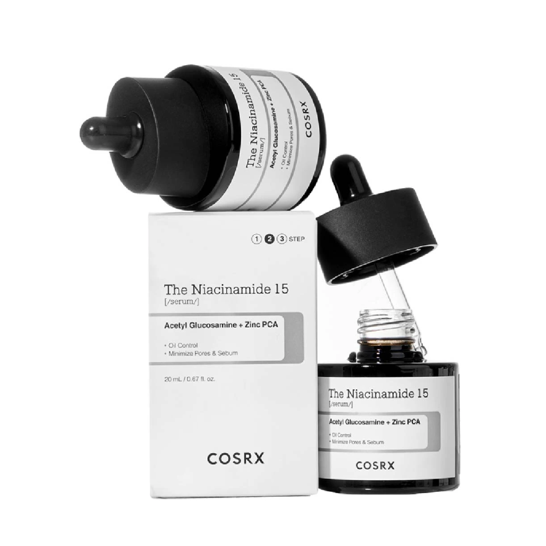 Cosrx skincare product set with serum bottles and packaging on a white background