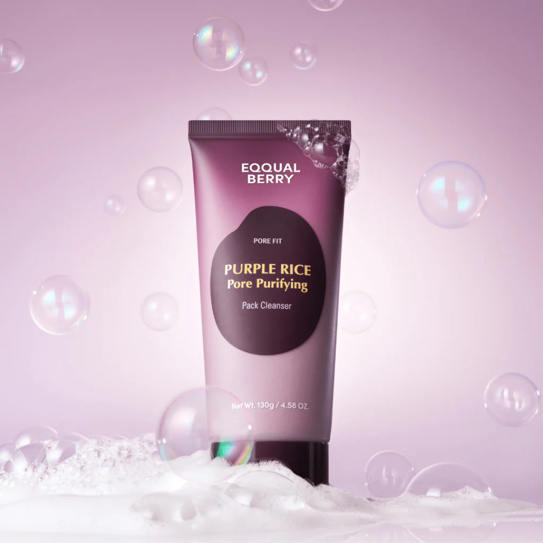 Tube of Equal Berry Purple Rice Pore Purifying Pack Cleanser on a pink background with bubbles.