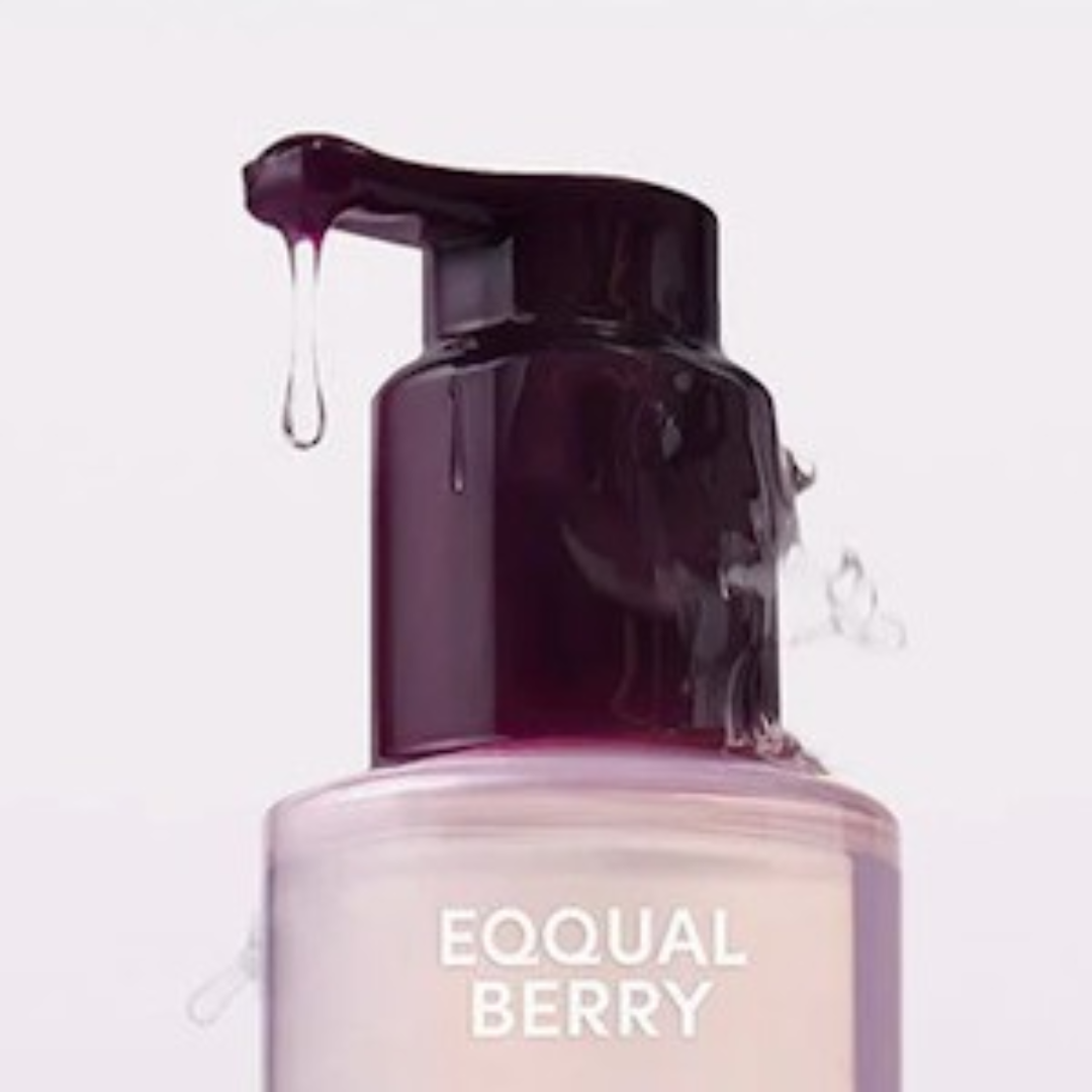 Cosmetic pump bottle with 'EQQUAL BERRY' branding on a light purple background