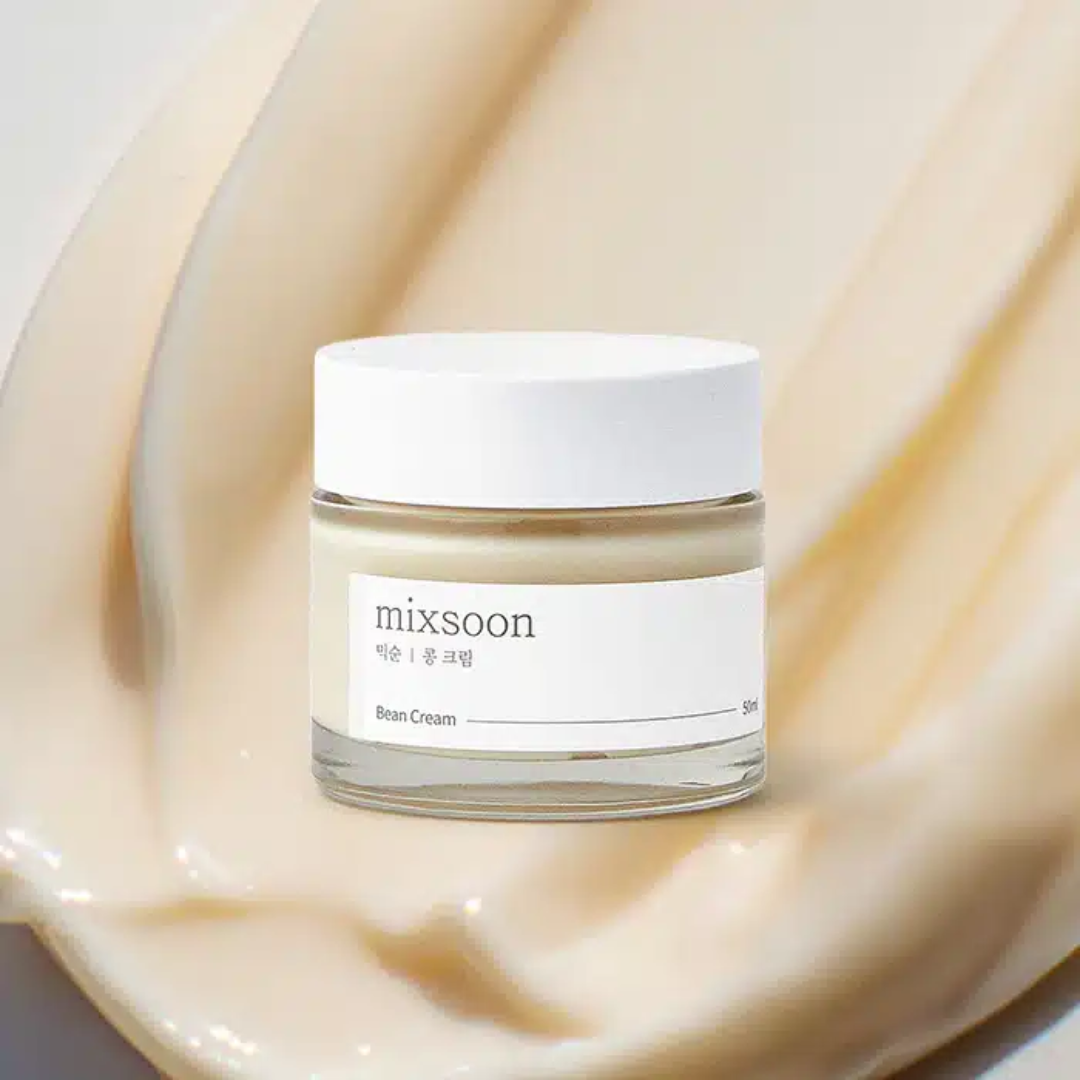 Jar of cream with 'mixsoon' label on a beige fabric background