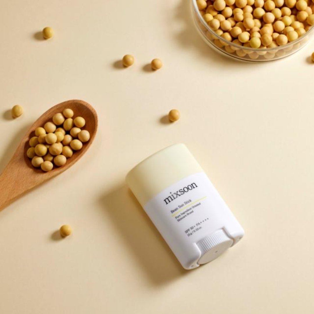 stick labeled 'mixsoon' with soybeans and a wooden spoon on a beige background