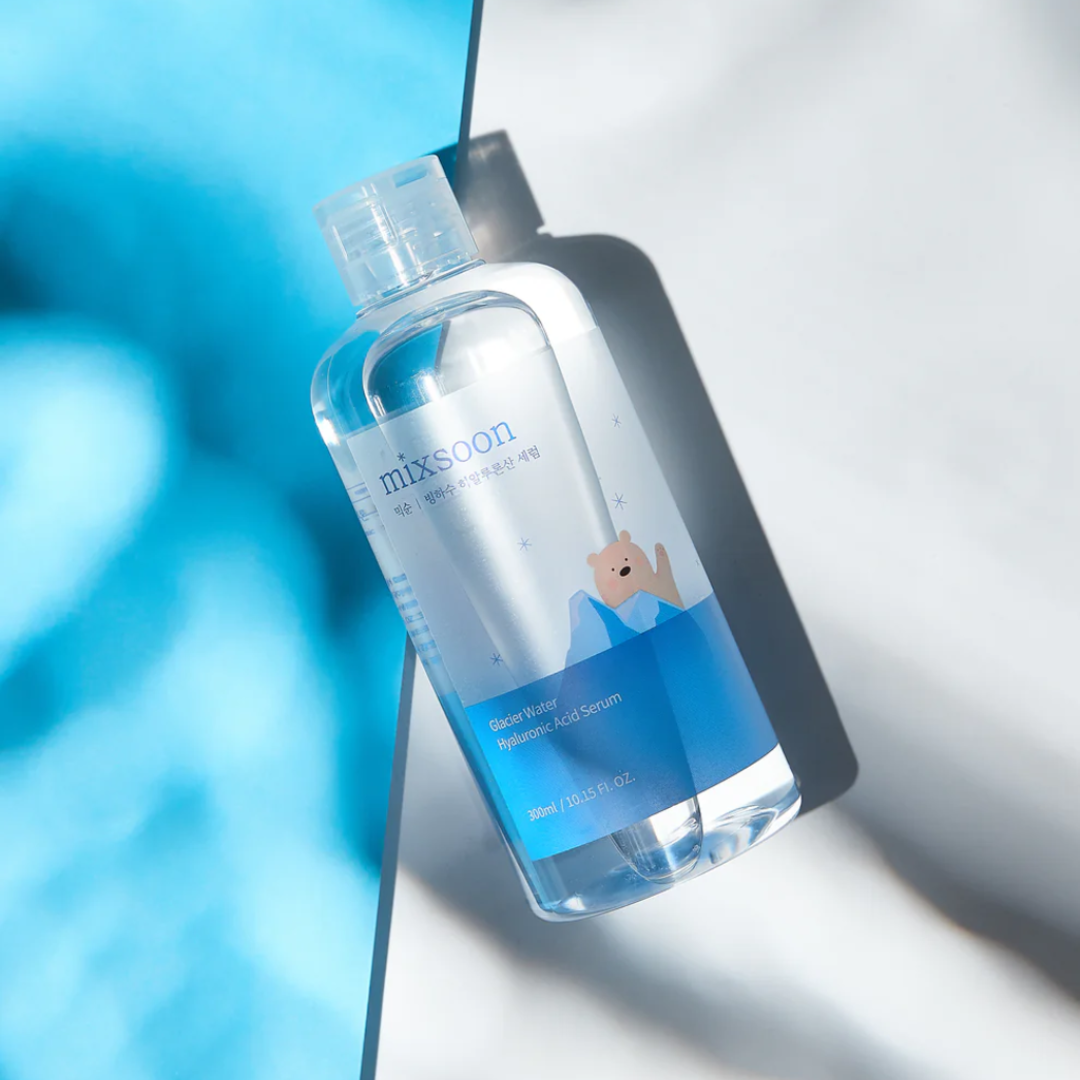 Skincare serum bottle with 'mixicon' branding on a light background