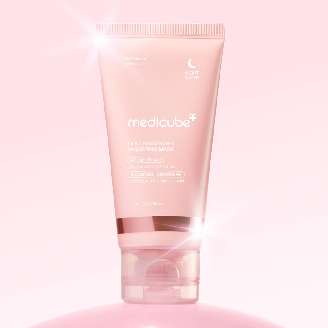 Pink skincare product with 'medicube' branding on a pink background