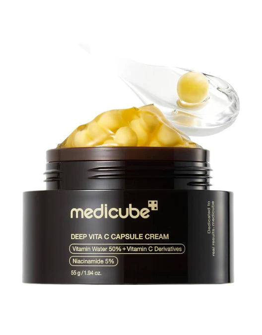 Medicube Deep Vita C Capsule Cream jar with open lid on a white background