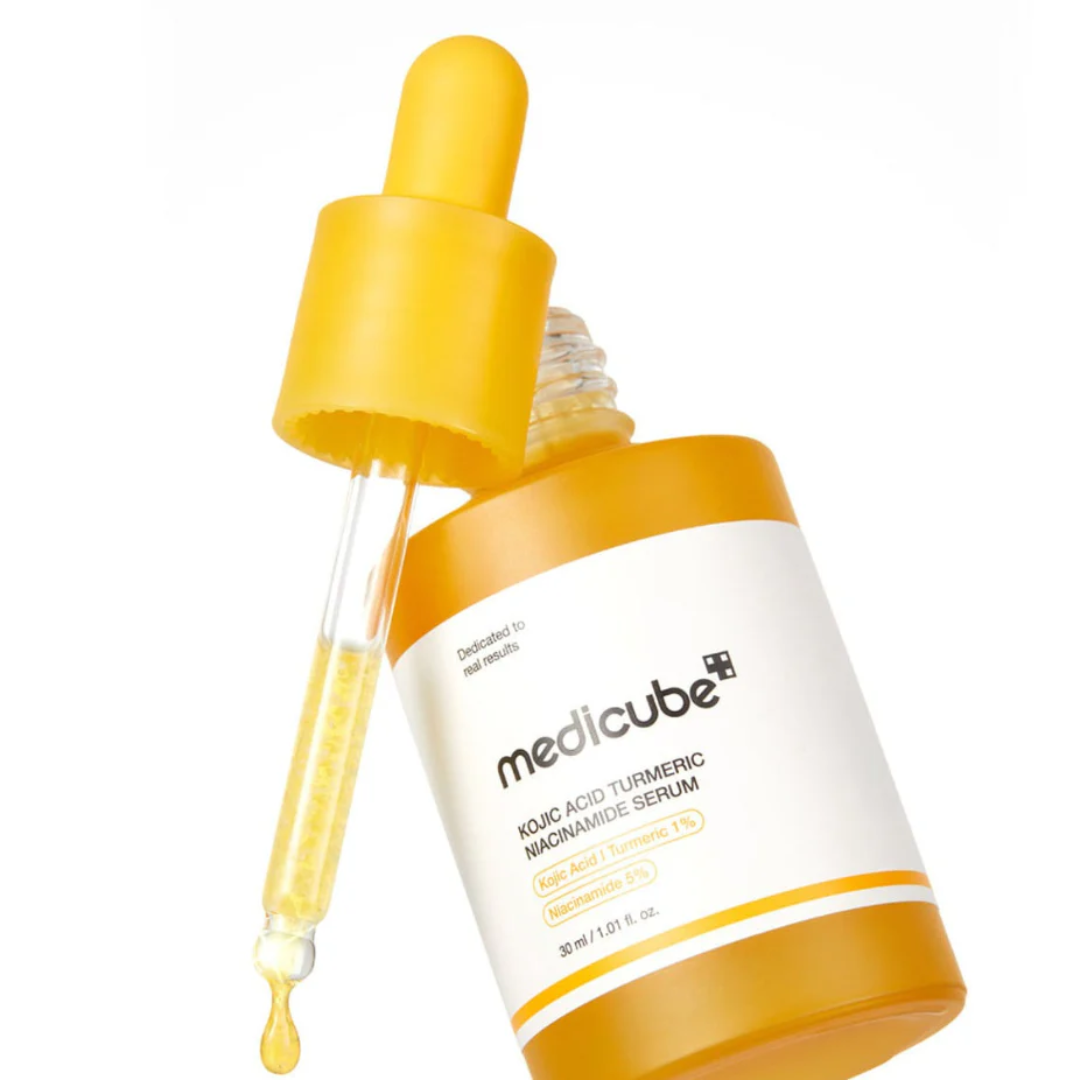 Medicube Kojic Acid Turmeric Niacinamide Serum bottle with dropper on a white background