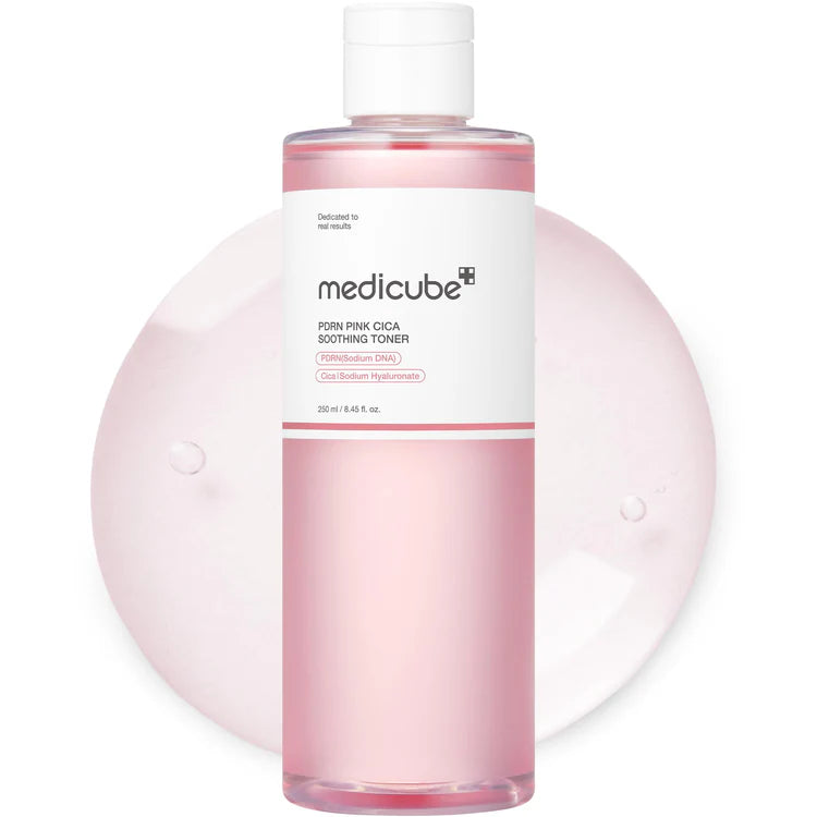 Pink bottle of Medicube toner on a white background