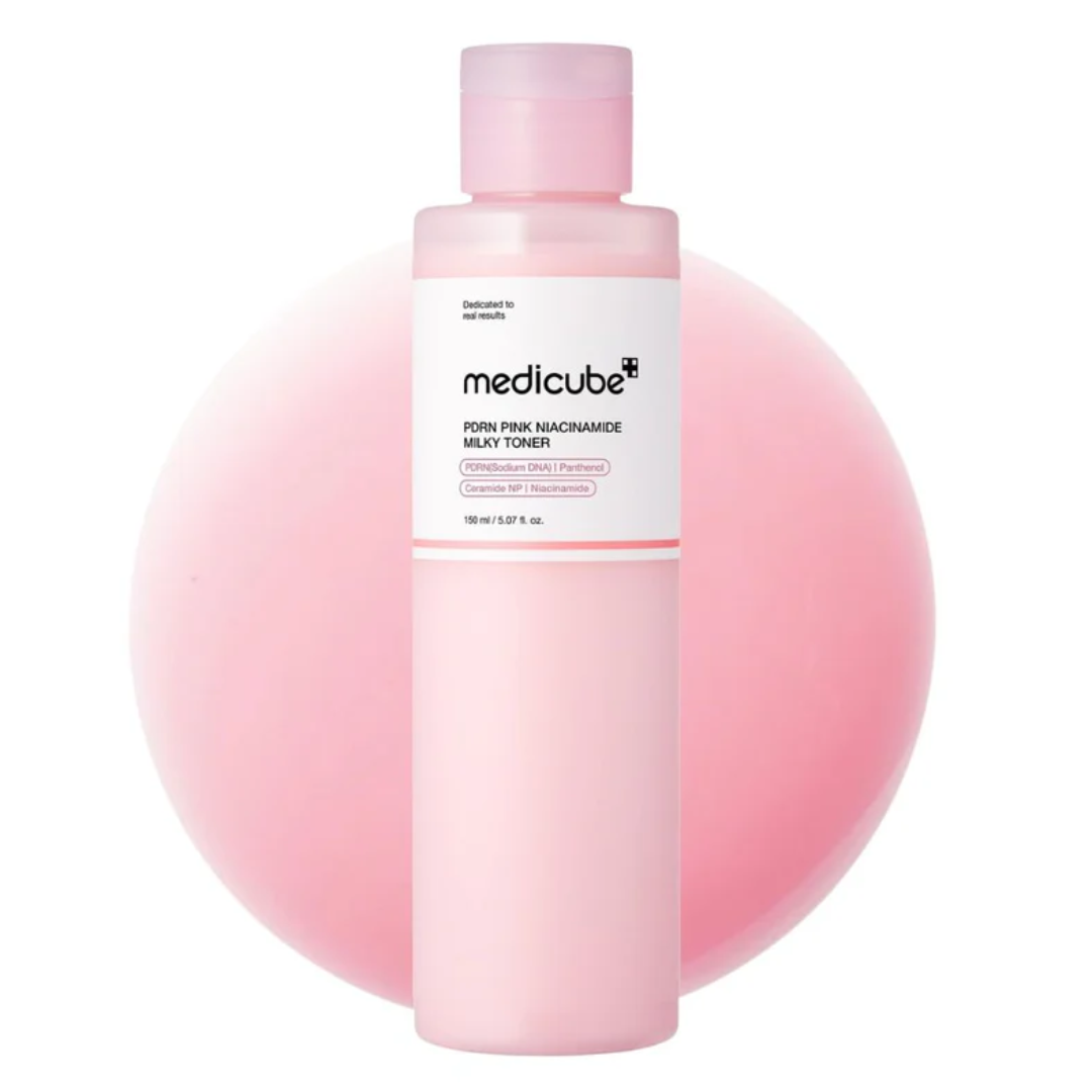 Pink bottle of Medicube toner on a white background
