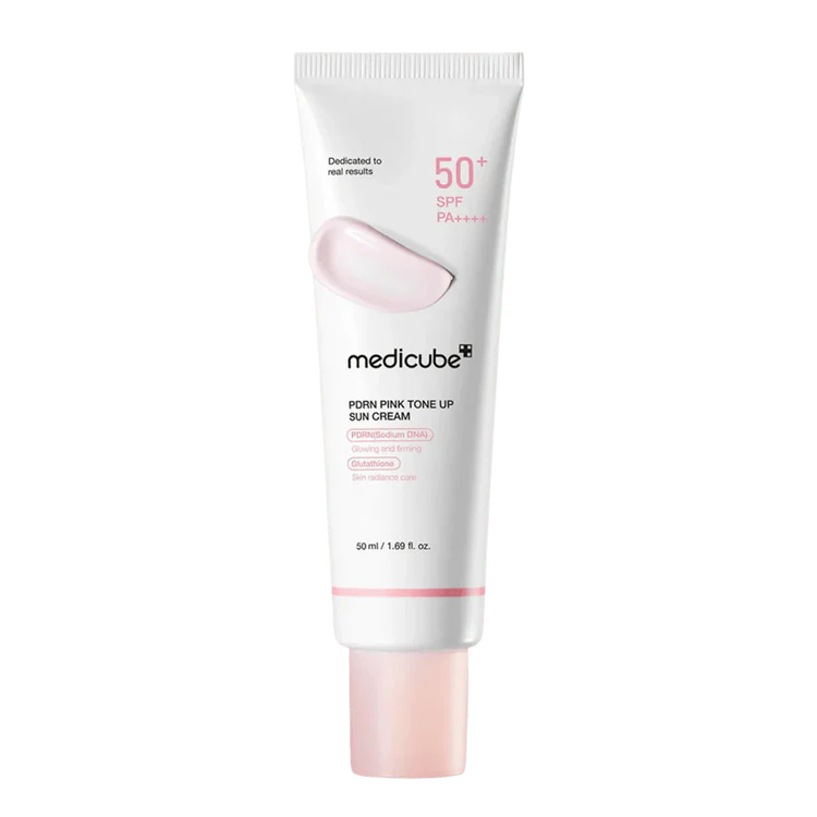 Tube of Medicube pink tone-up sun cream on a white background
