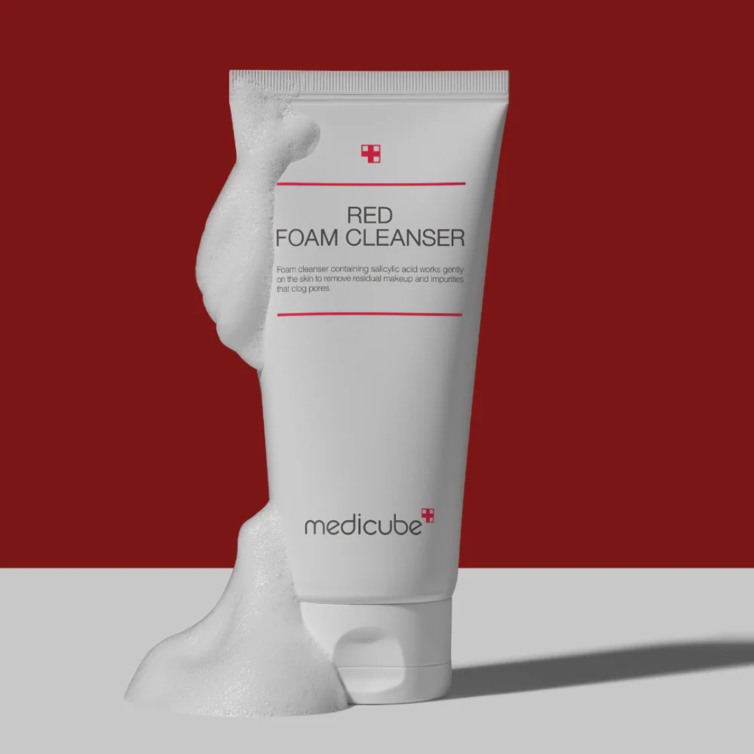 Tube of Medicube Red Foam Cleanser on a red background