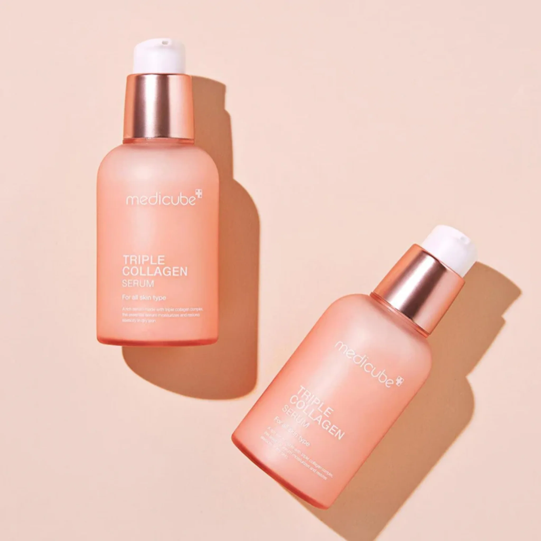 Two bottles of Mediclean Triple Collagen Serum on a beige background