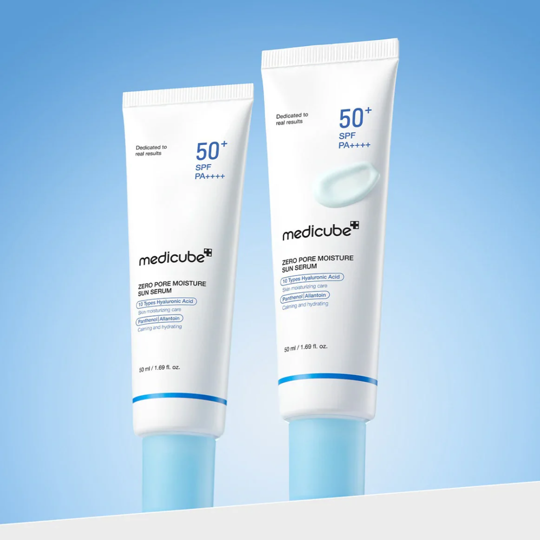 Two tubes of Medicube sunscreen on a light blue background