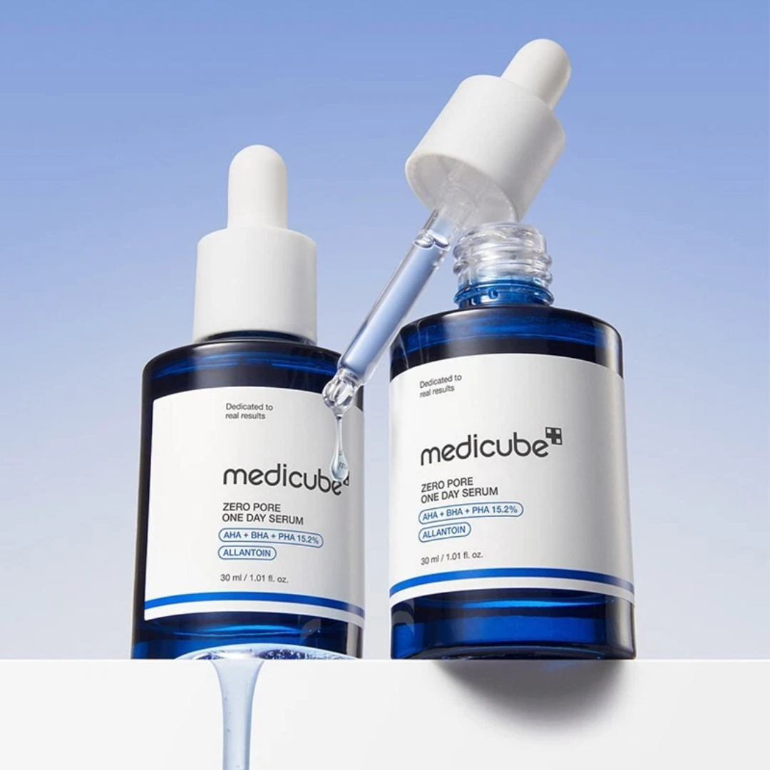 Two bottles of Medicube Zero Pore One Day Serum with droppers on a gradient blue and white background.