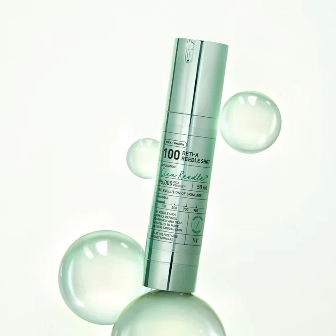 Skincare serum bottle with spherical bubbles on a white background