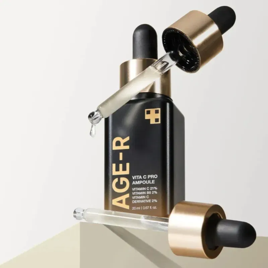 AGE-R skincare ampoule bottle with dropper on a light background
