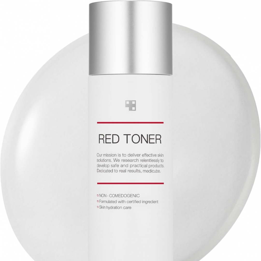 White bottle of Red Toner with a silver cap on a white background