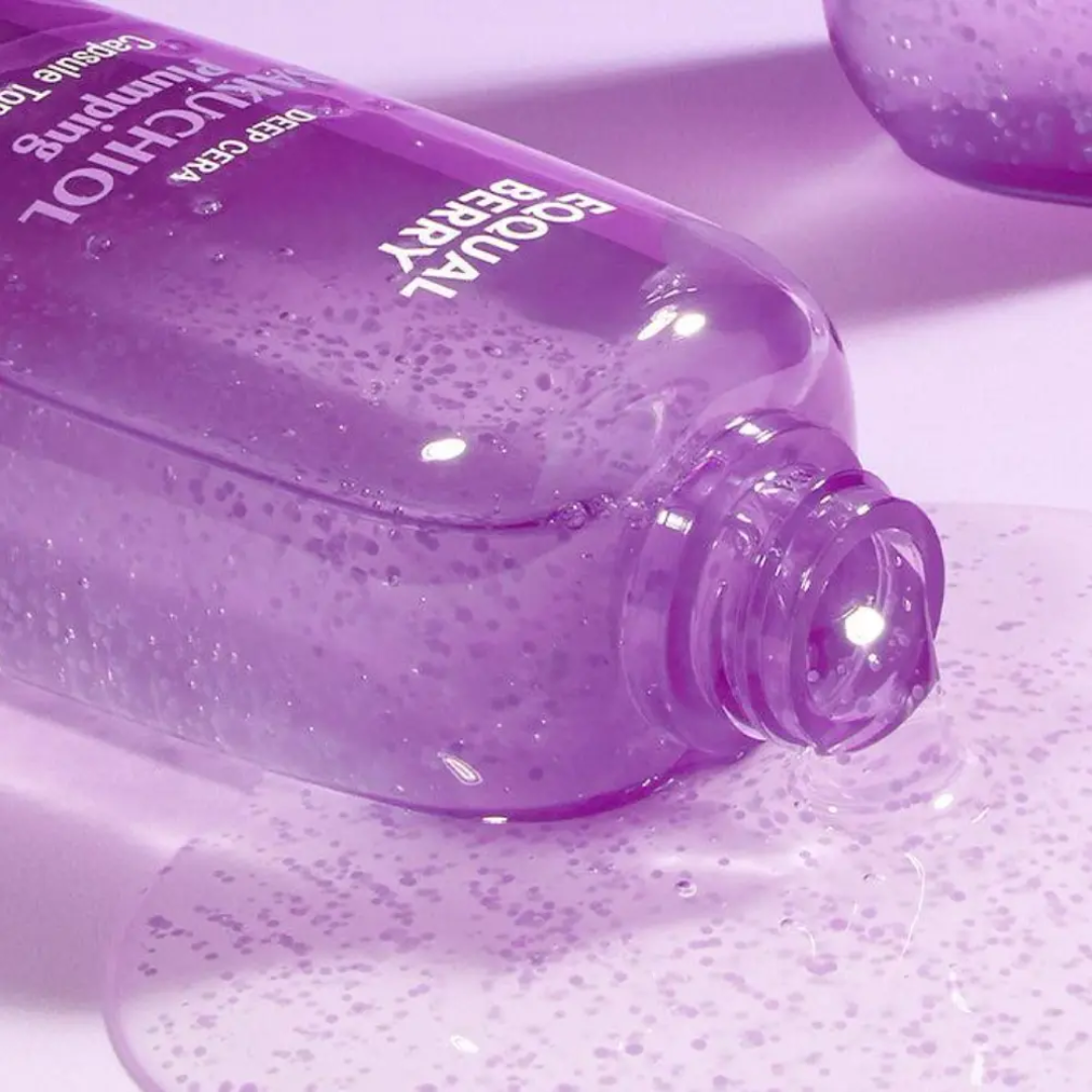 Purple bottle of Eucerin product on a light purple background