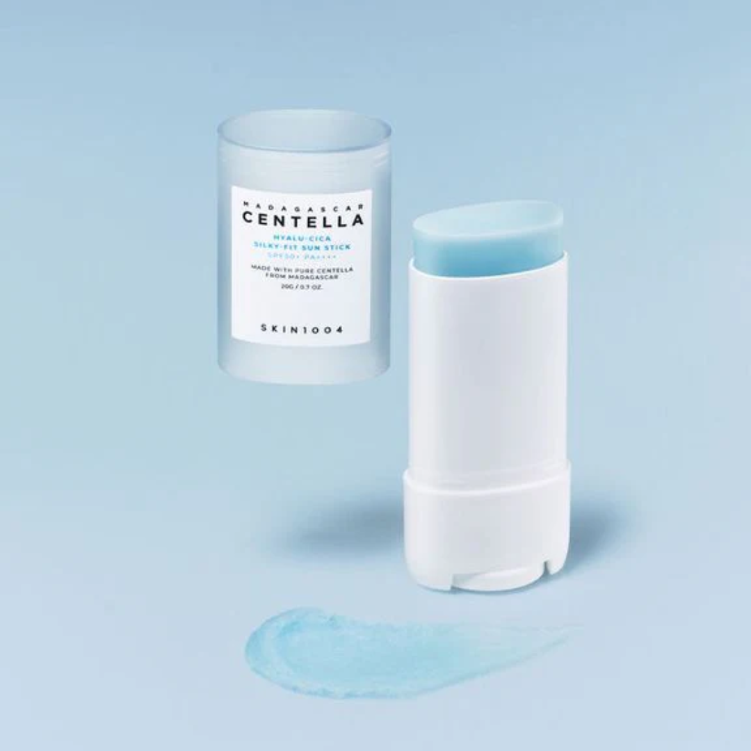 Skintouch Centella product with packaging on a light blue background