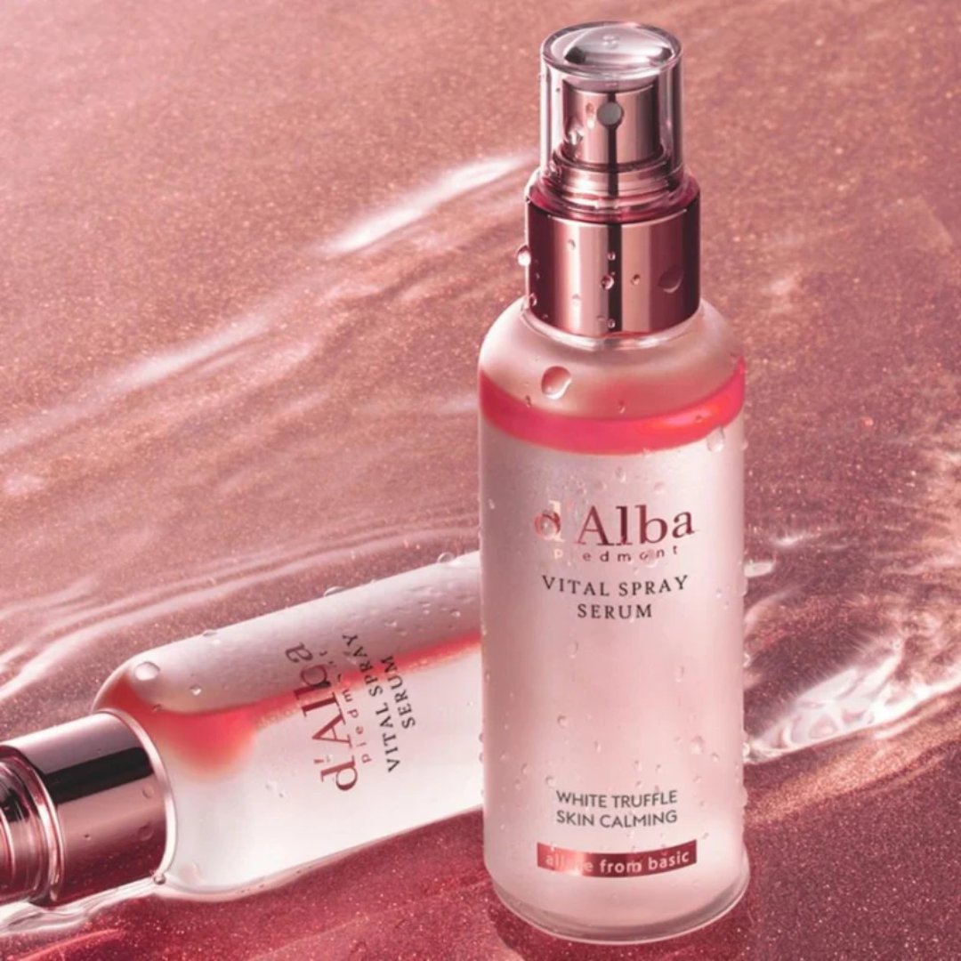 Alba Vital Spray Serum bottle on a pink background