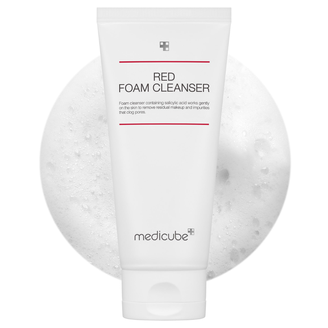 Medicube Red Foam Cleanser with bubbles on a white background