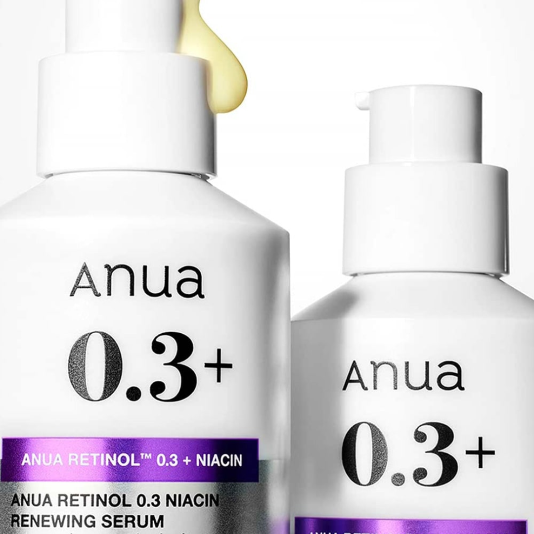 Two bottles of Anua 0.3+ skincare serum on a white background