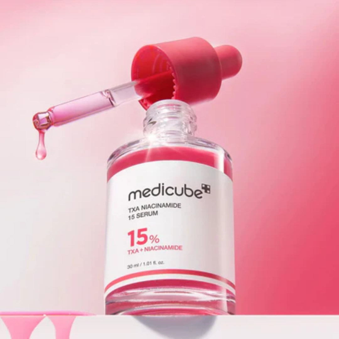 Medicube TCA Niacinamide 15% Serum bottle with dropper on a pink background
