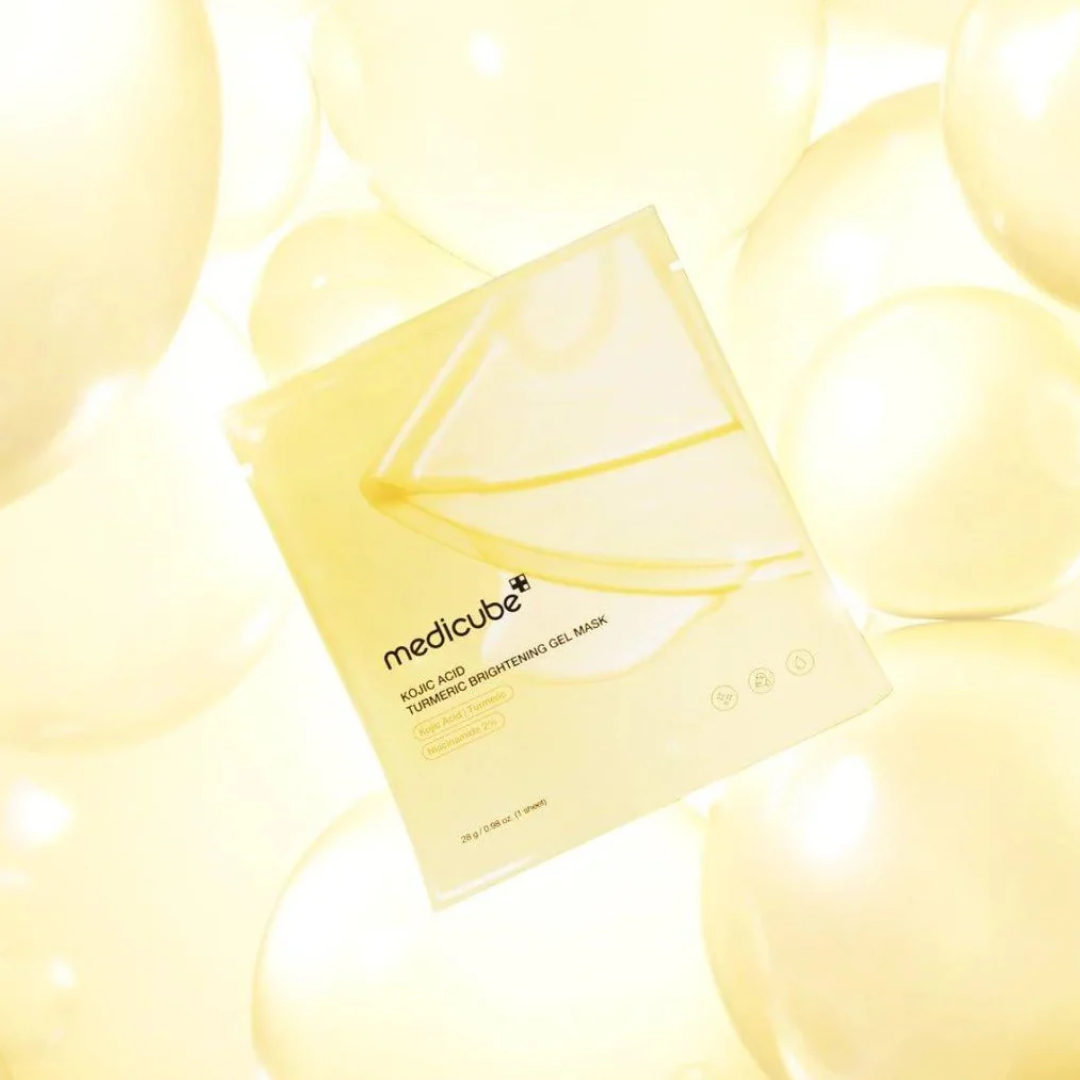 Medicube face mask packaging with yellow balloons in the background