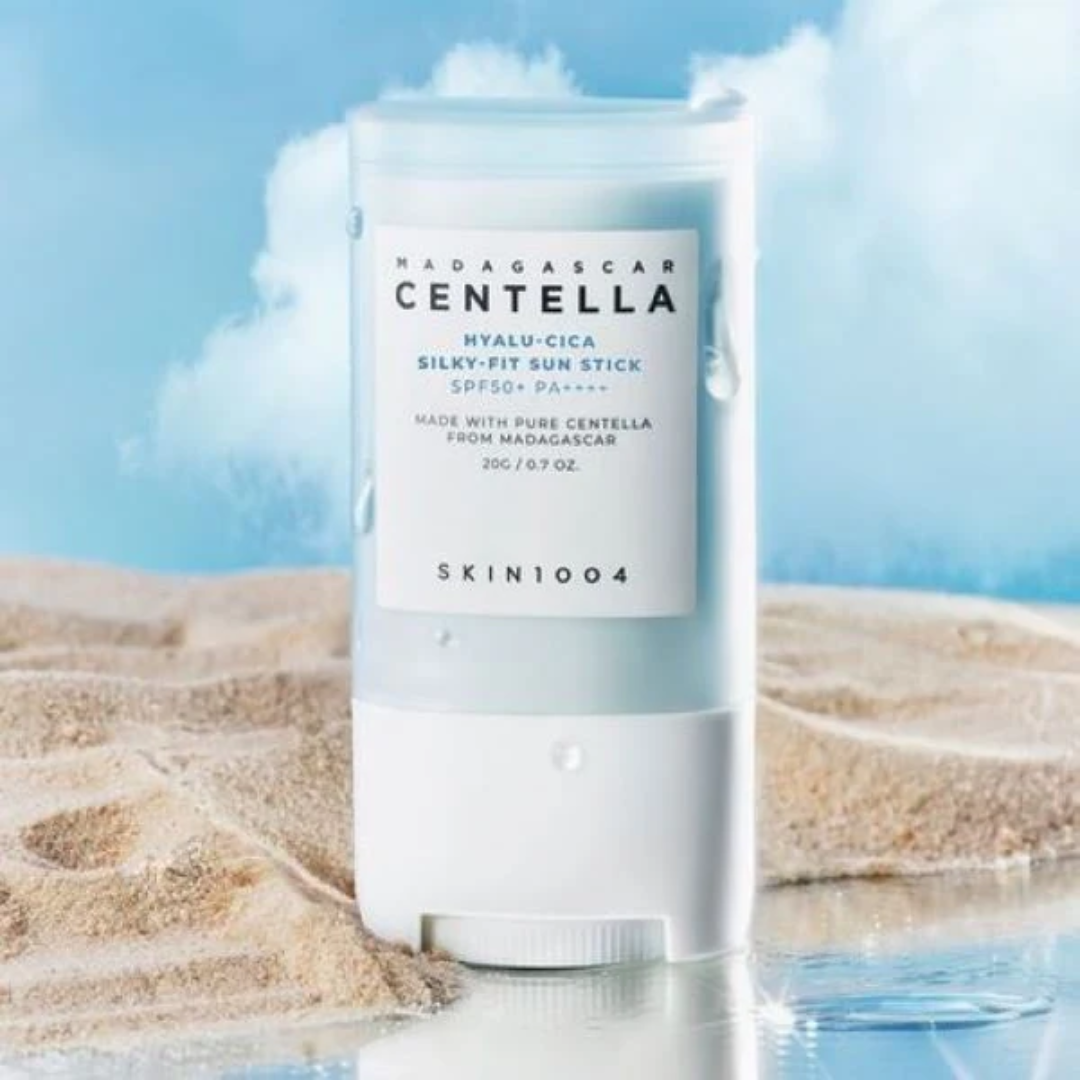 Sun stick with Madagascar Centella label on a beach background