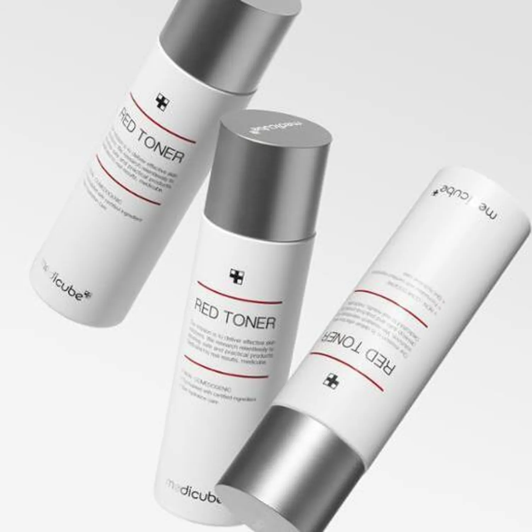 Three bottles of Red Toner by Medicube on a light gray background