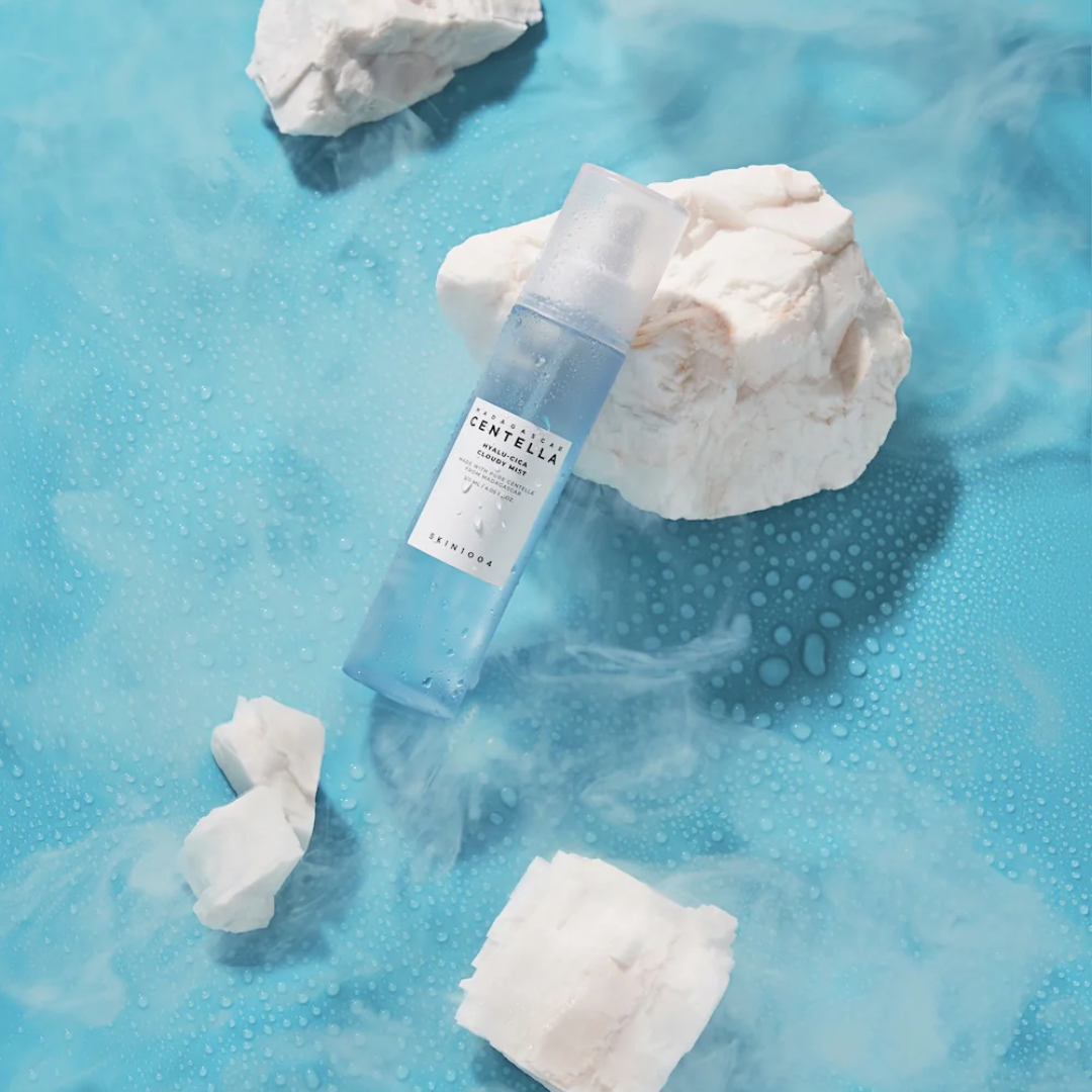 Skincare product with Centella Asiatica on a blue textured background