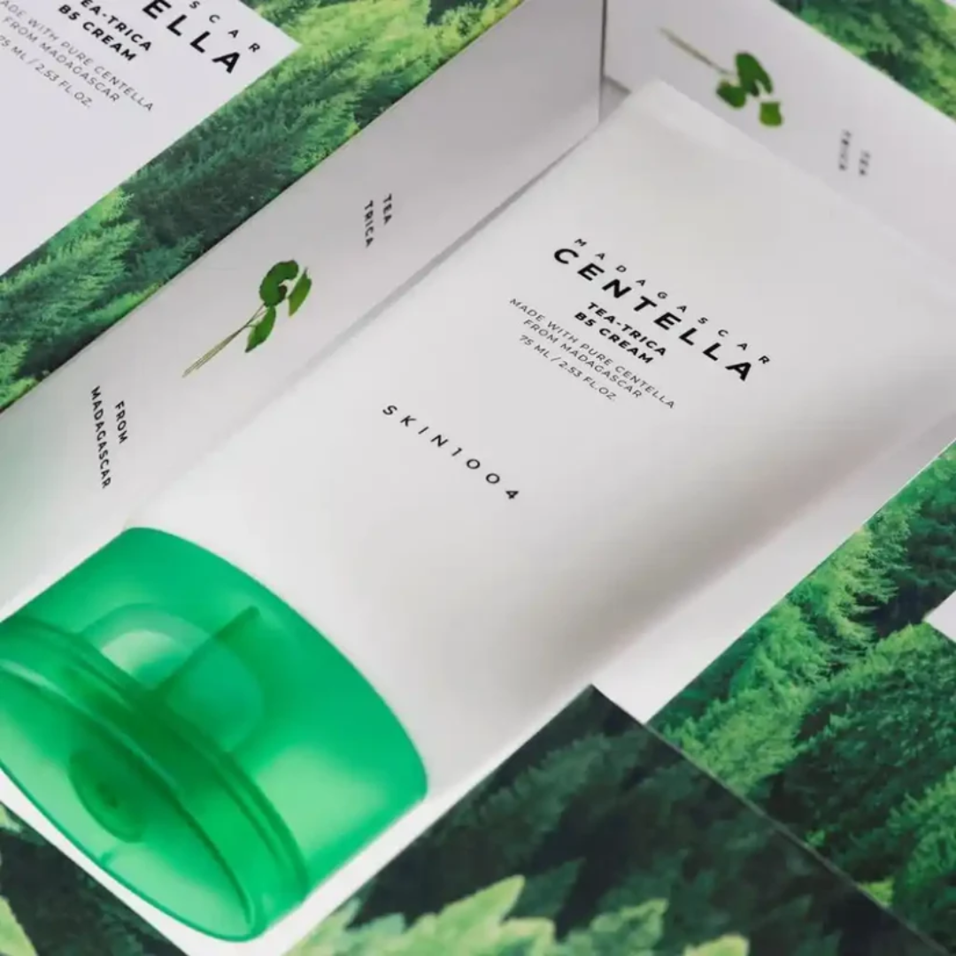 Green skincare product with Centella Asiatica branding on a white background