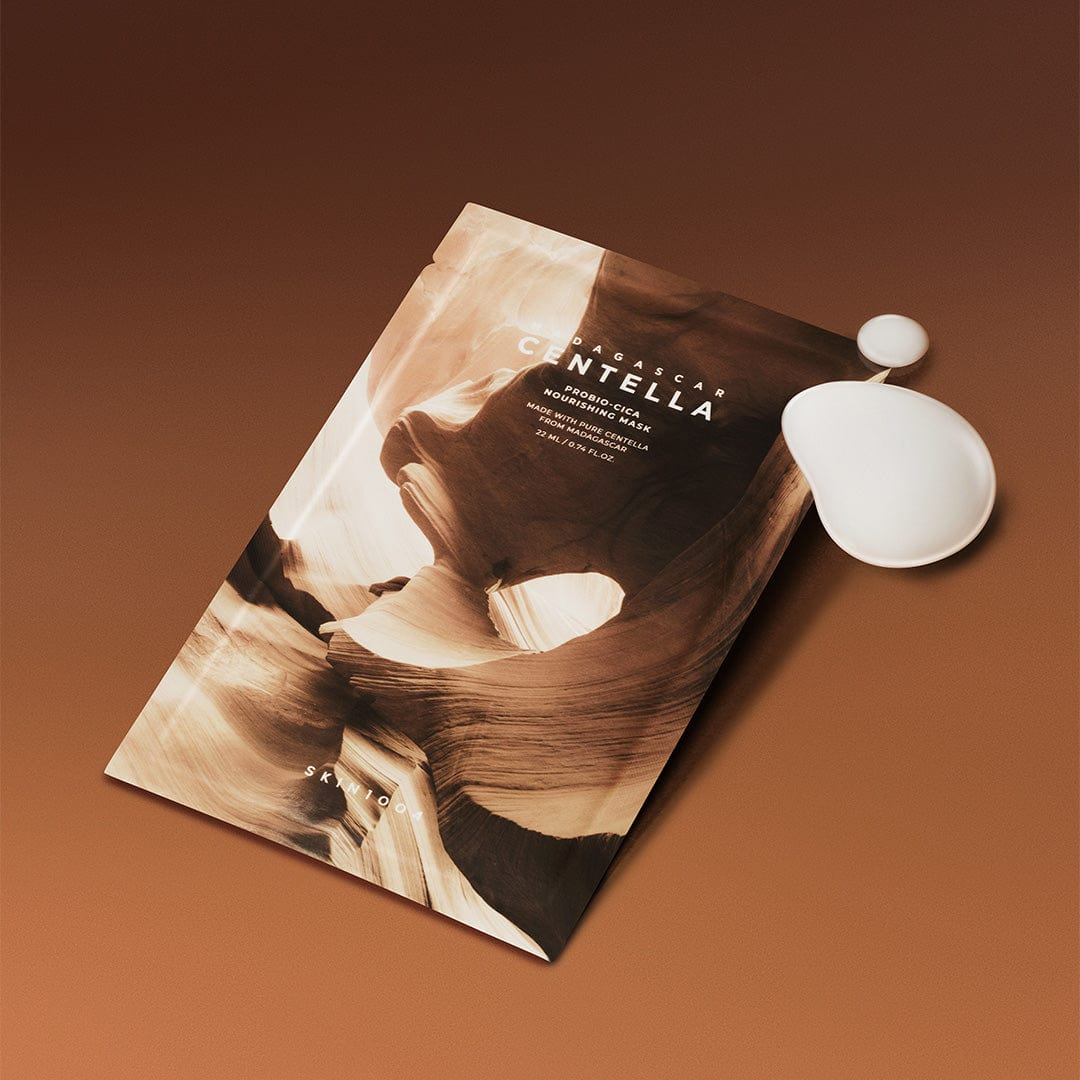 Centella mask packaging with white droplet on brown background
