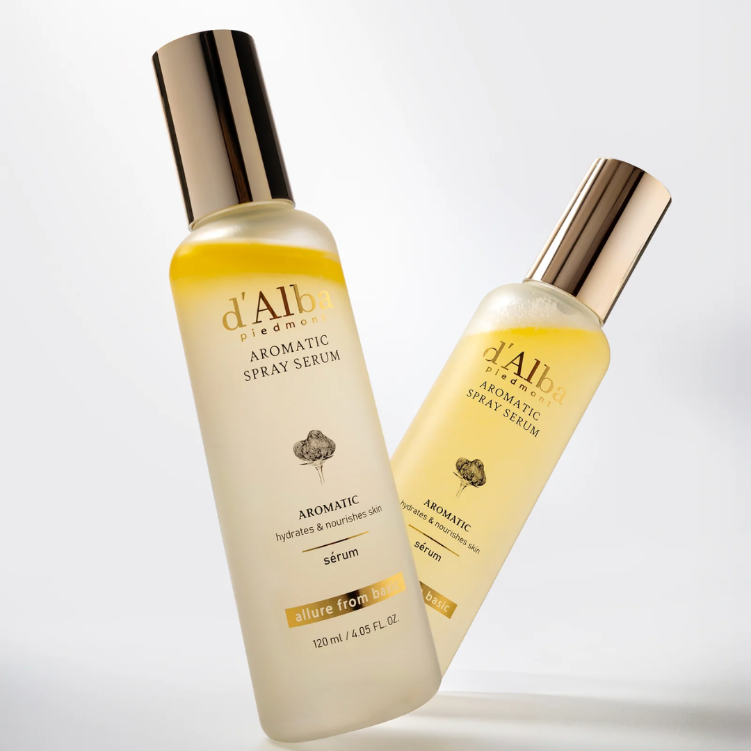 Two bottles of d'Alba Aromatic Spray Serum on a light gray background