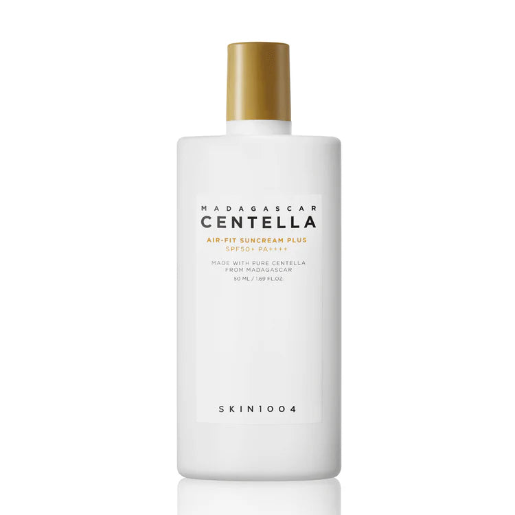 White bottle of Madagascar Centella Air Fit Suncream Plus with gold cap on a white background
