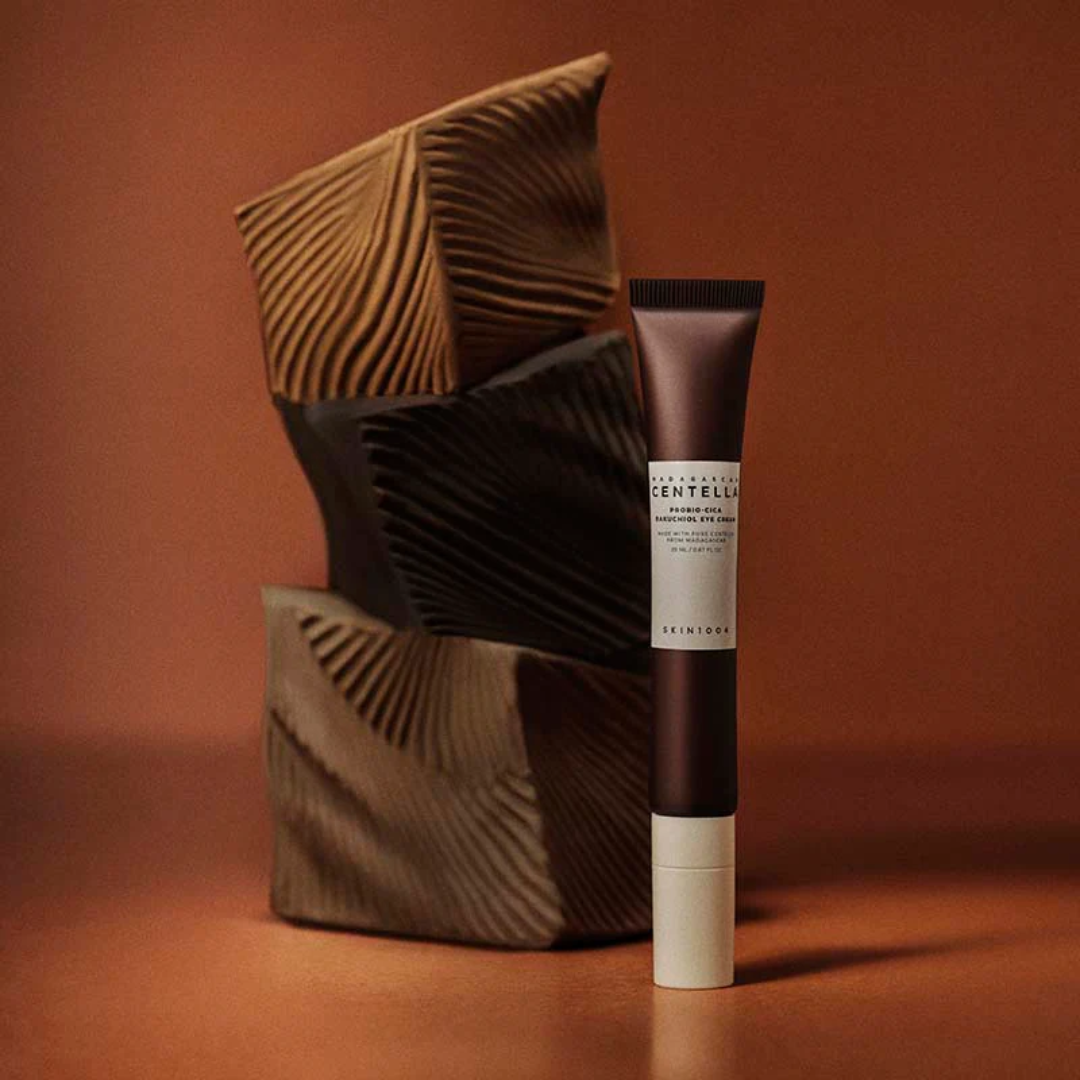 Skincare tube with a textured brown package on a matching background