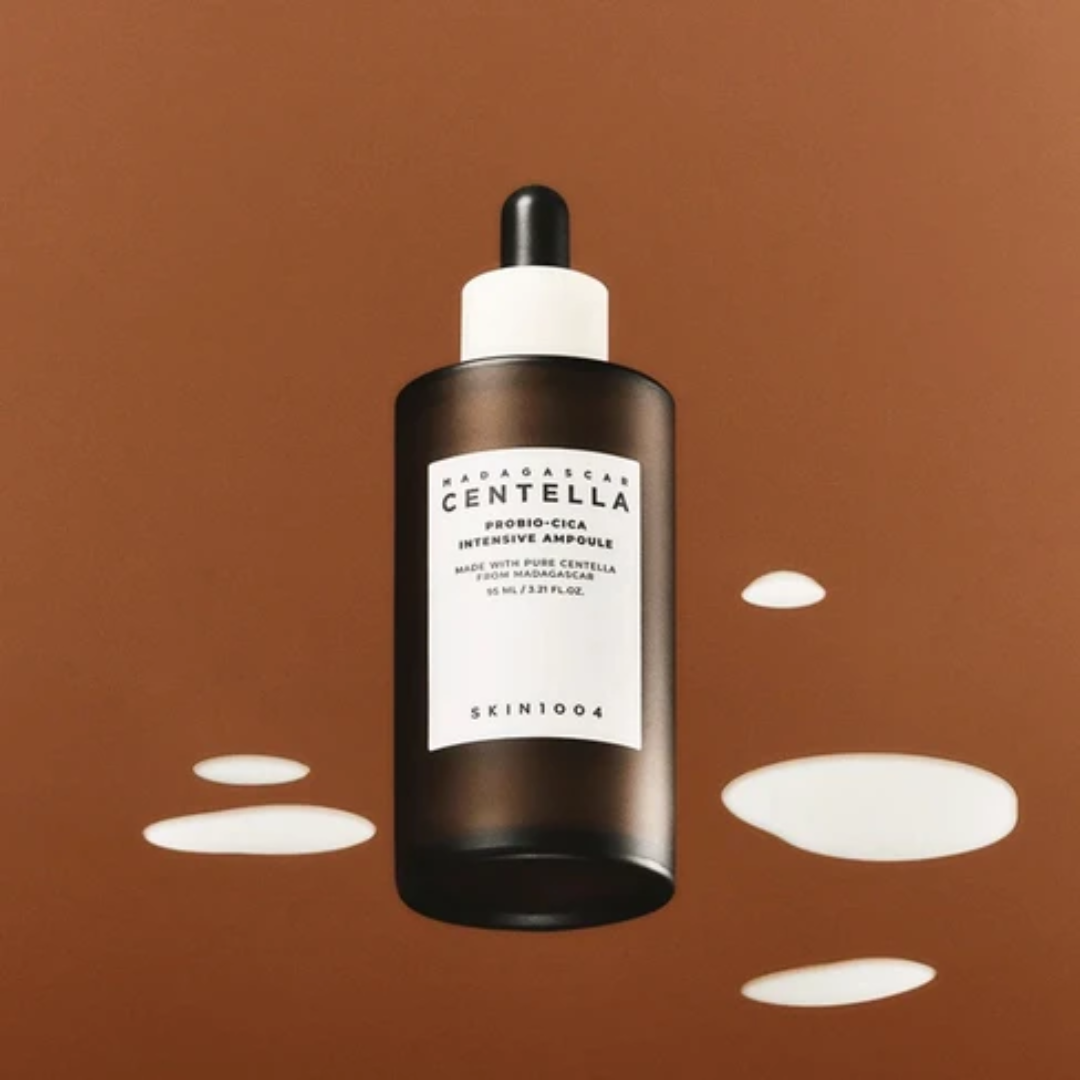 Skincare dropper bottle with a brown label on a brown background