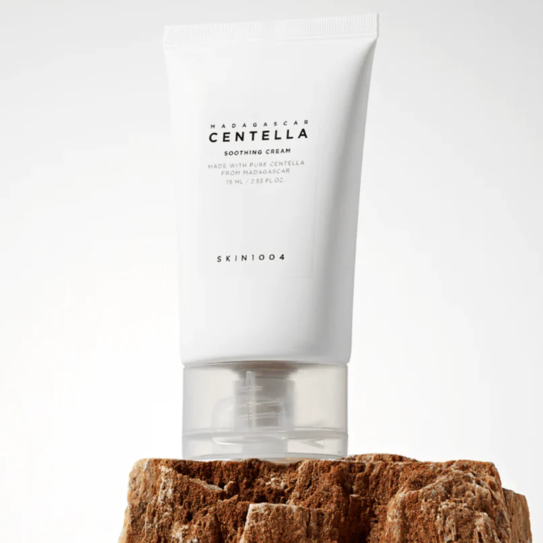 Skint004 Centella Soothing Cream on a wooden block with a white background